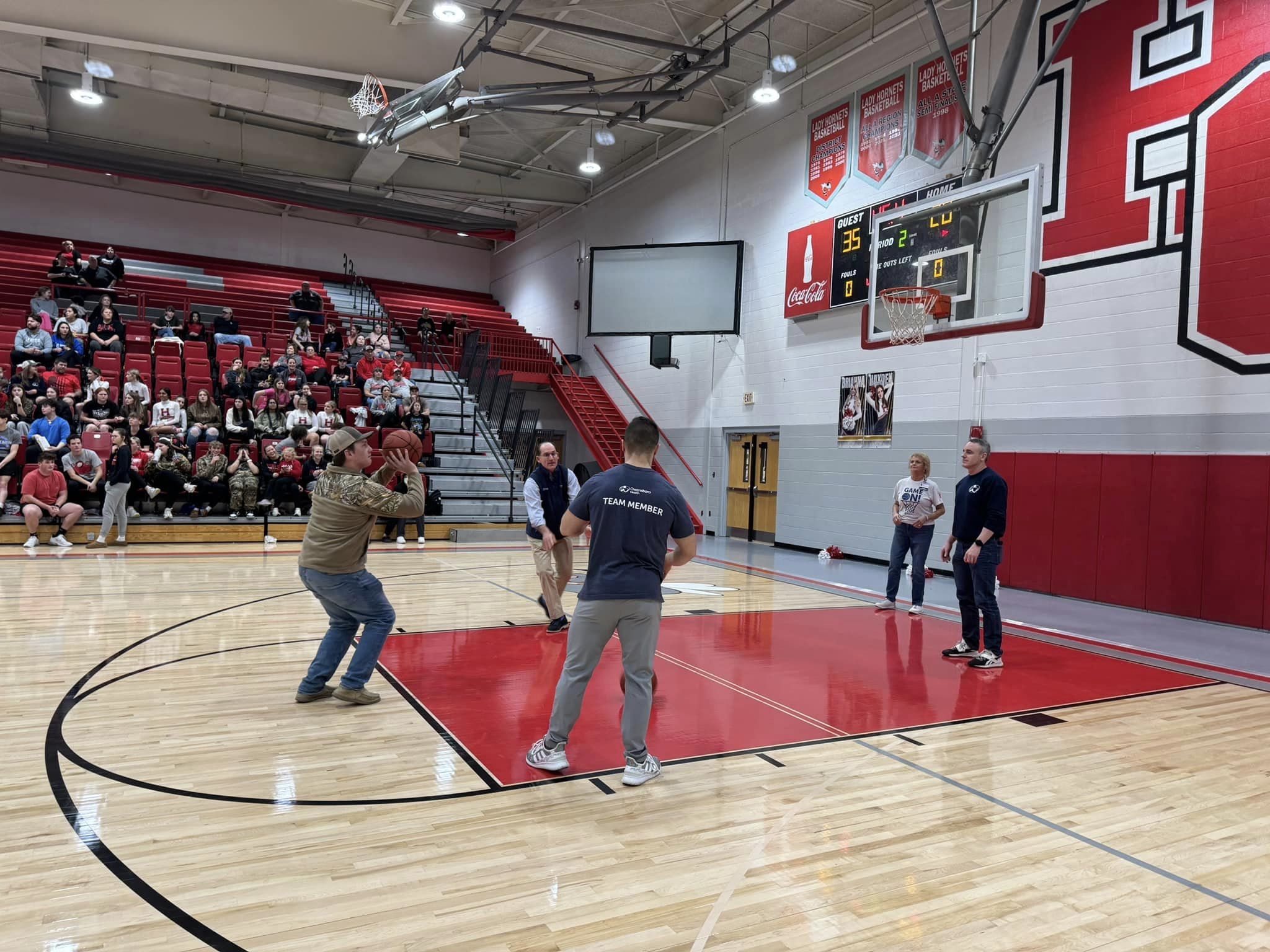 student attempting a free throw shot