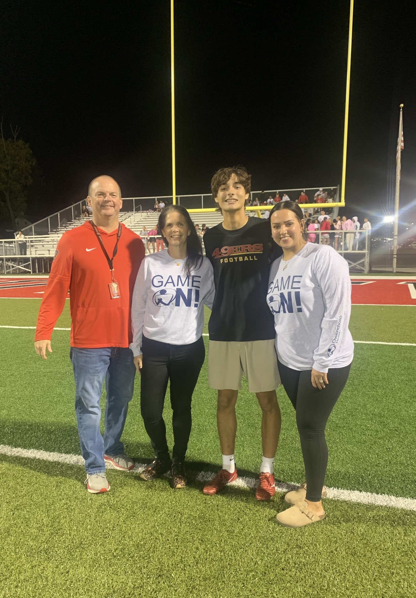 group photo on a football field