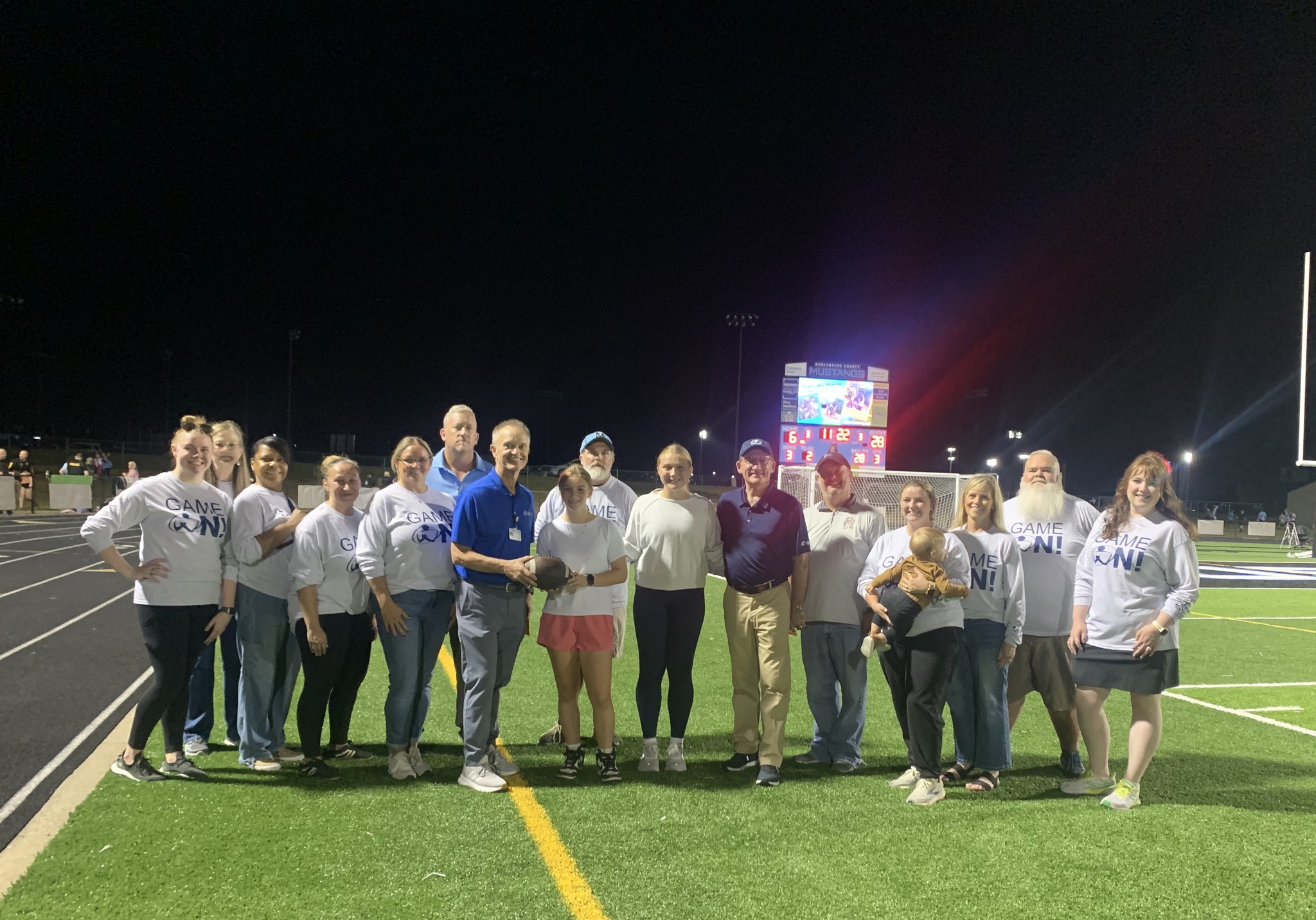 group photo on a football field