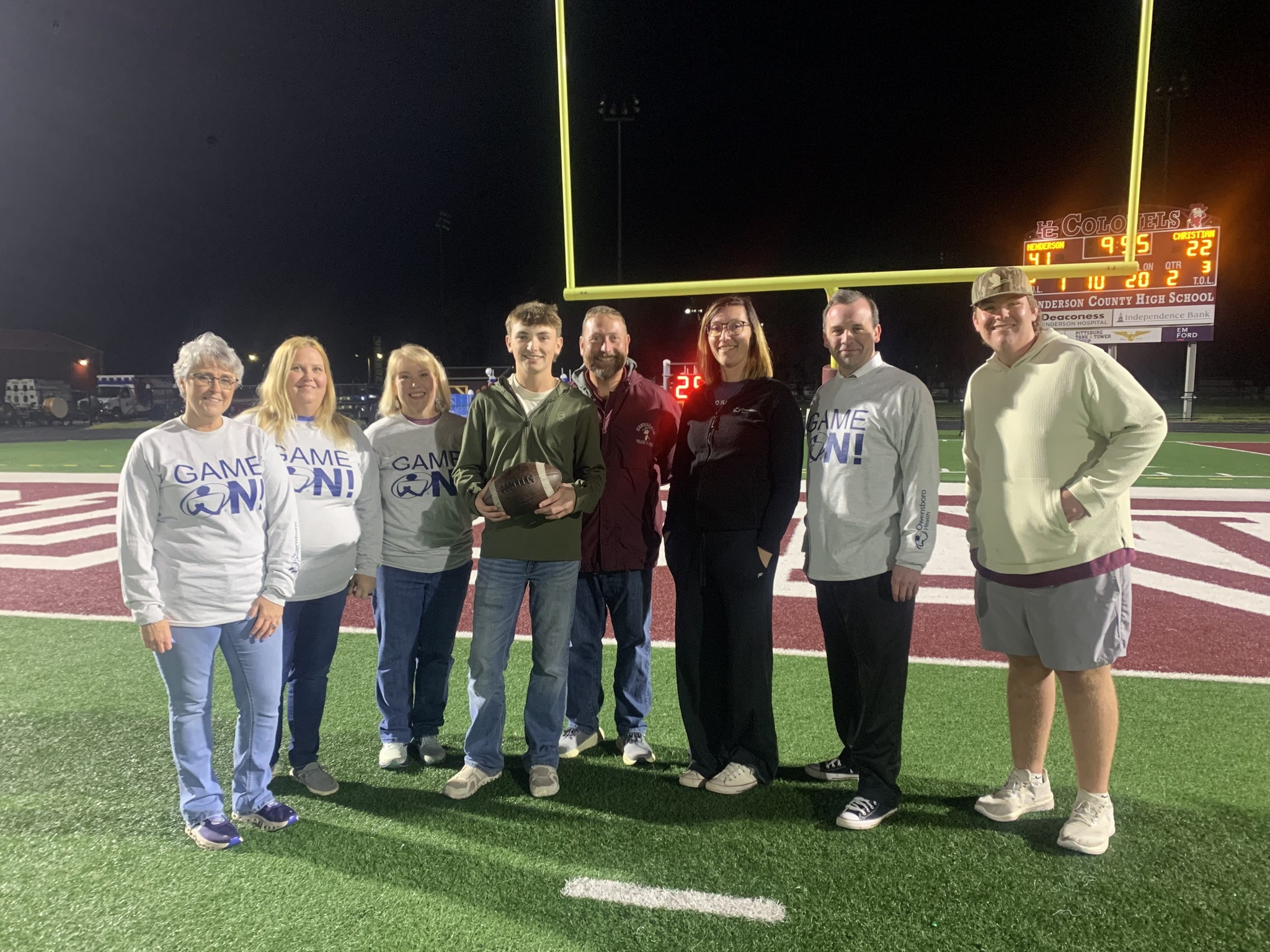group photo on a football field