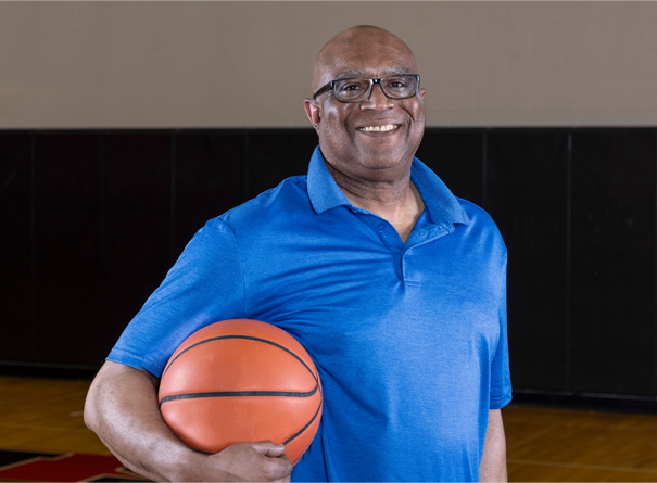 Rod Drake holding a basketball