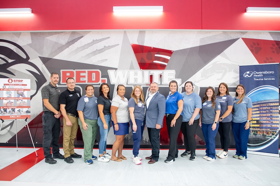 A group of first responders pose for a team photo