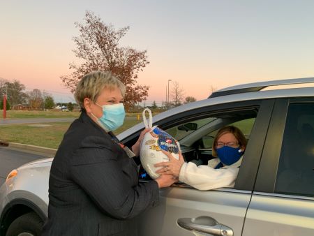 Debbie Bostic at holiday gift drive-thru