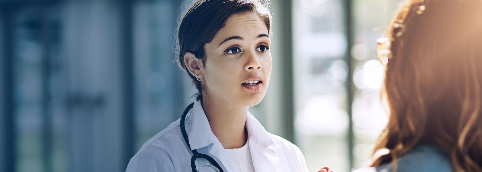 Physician talking to a patient