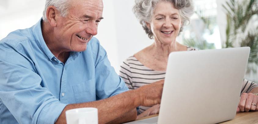 older couple pre-registering online