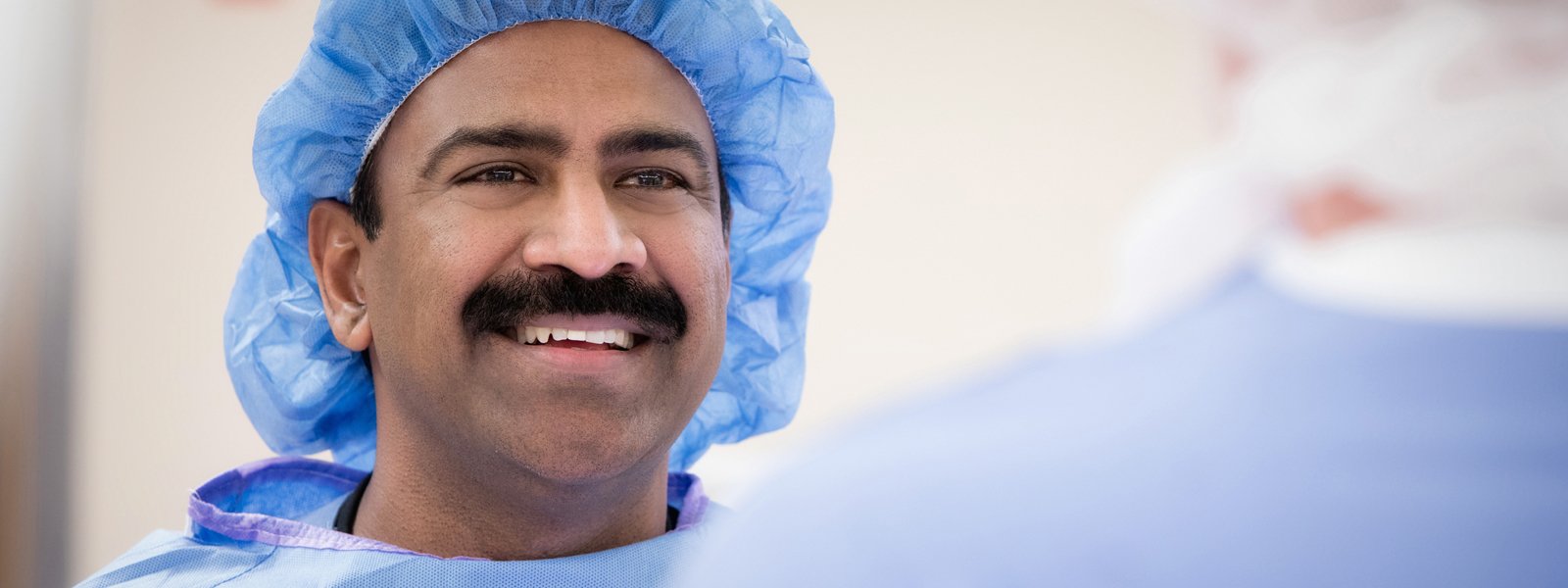 Dr. Ravi Alapati in surgical cap