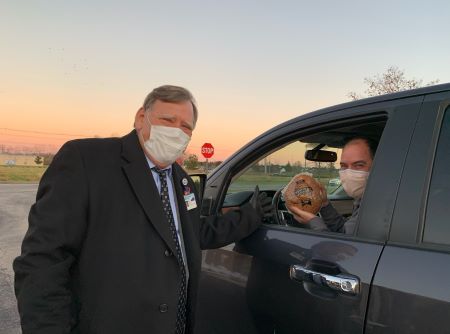 John Hackbarth at holiday gift drive-thru