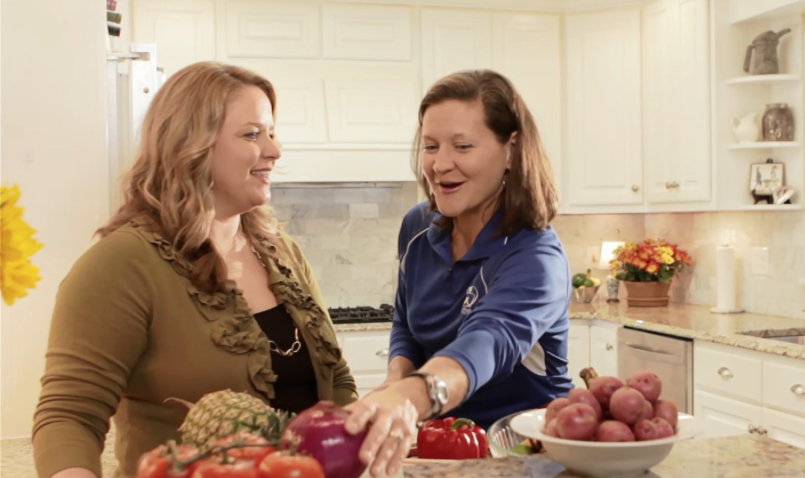 Women discussing healthy food options