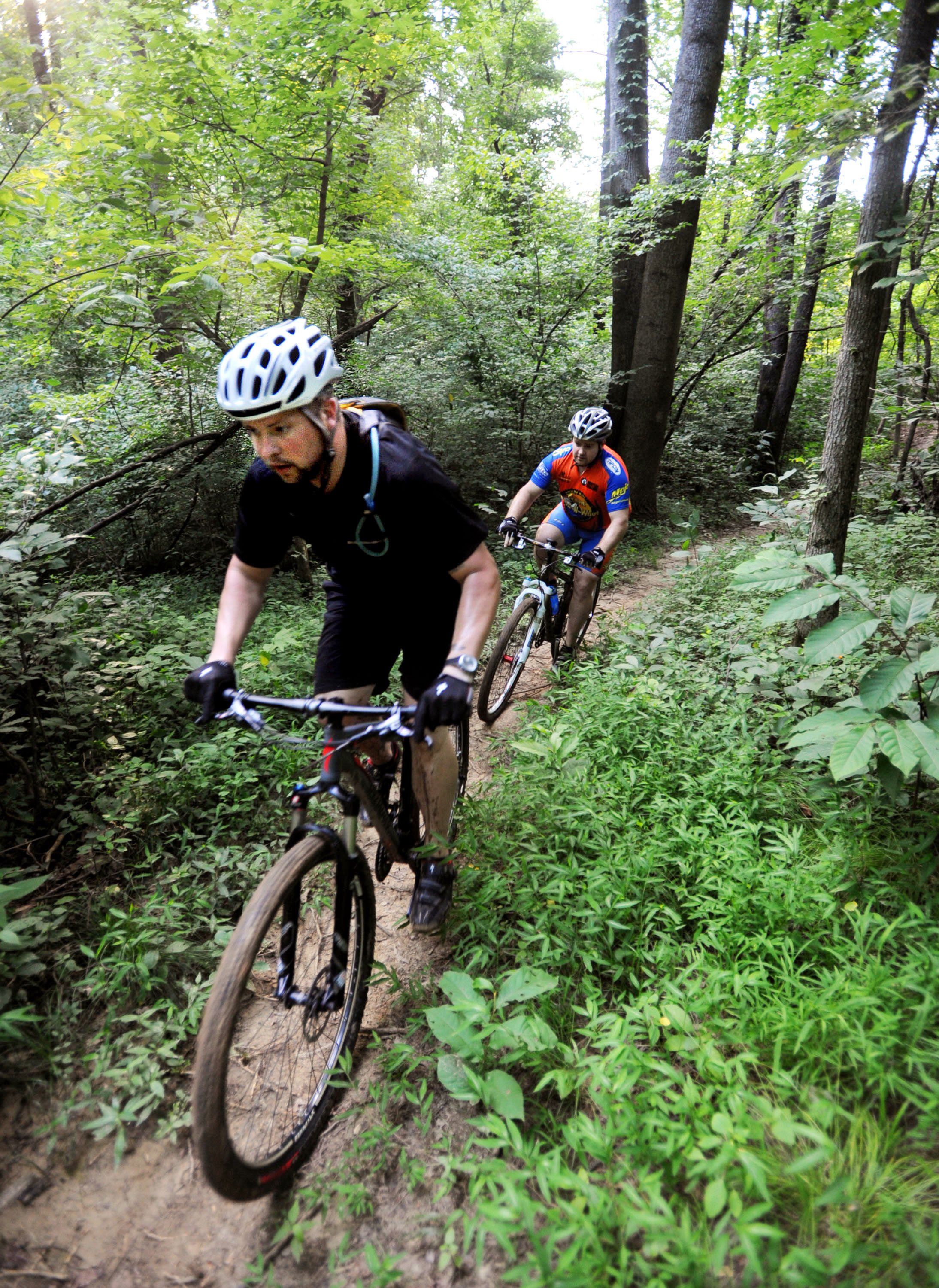 men riding bikes