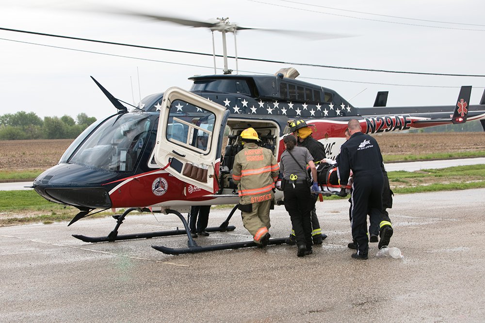 loading people into helicopter