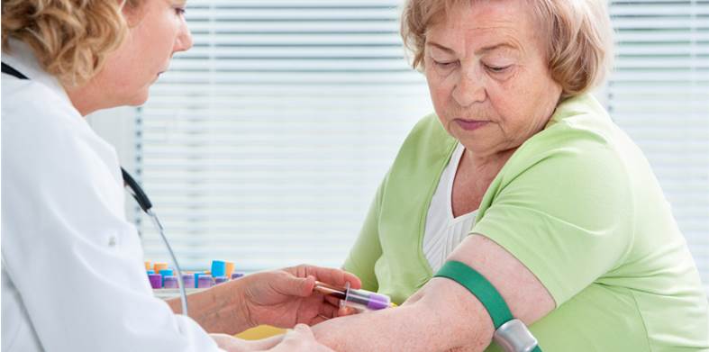 woman getting her blood drawn