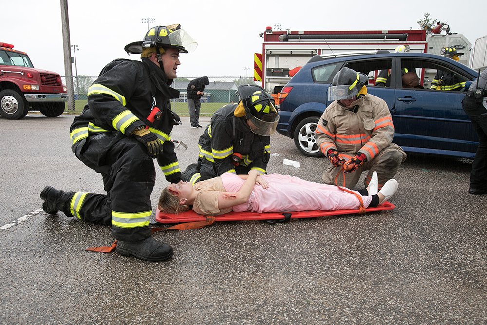 first responders trying to help a fake victim