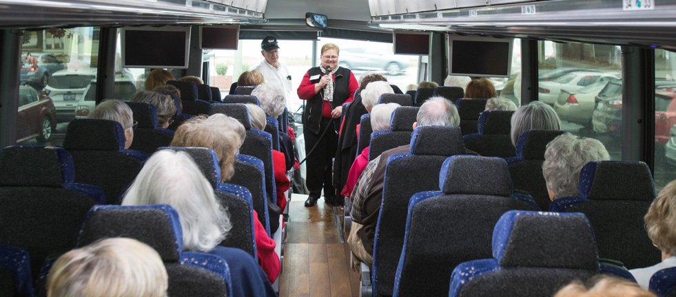 Golden partners on a tour bus