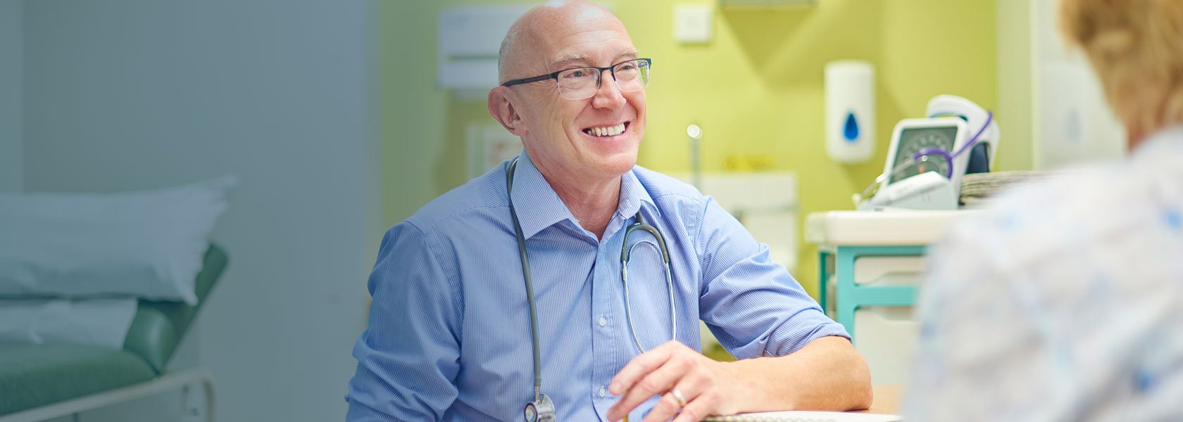 Doctor speaking with a patient