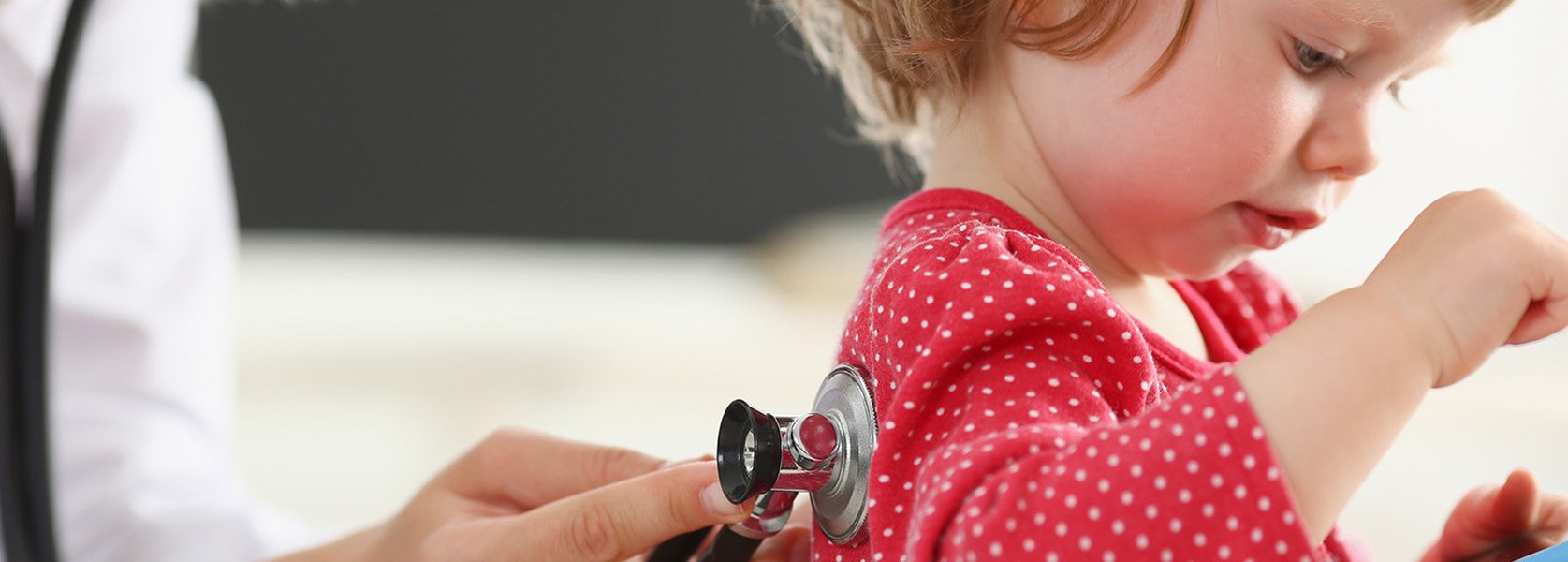 little girl getting check up