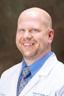 Dr. Aaron Smith