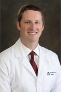 Dr. Chris Riney