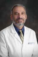 Dr. Mhroos Peters