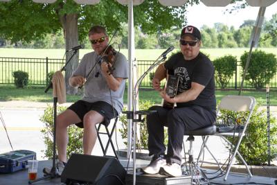 two men playing music