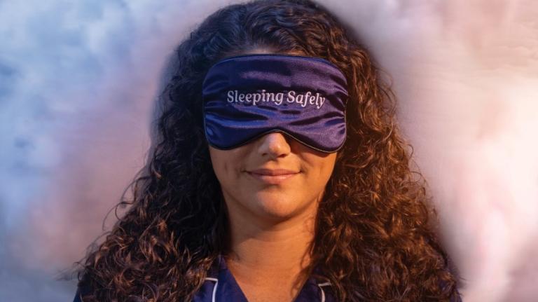 woman wearing sleep mask woman wearing sleep mask