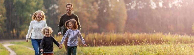 active young family on a walk