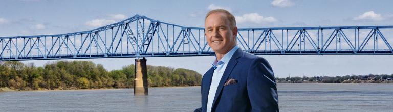 Mark Marsh in front of a bridge