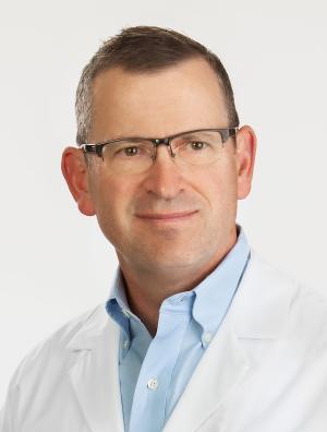 portrait of male doctor in white coat