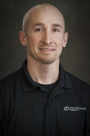 man in black polo shirt