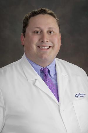 man in white dr coat
